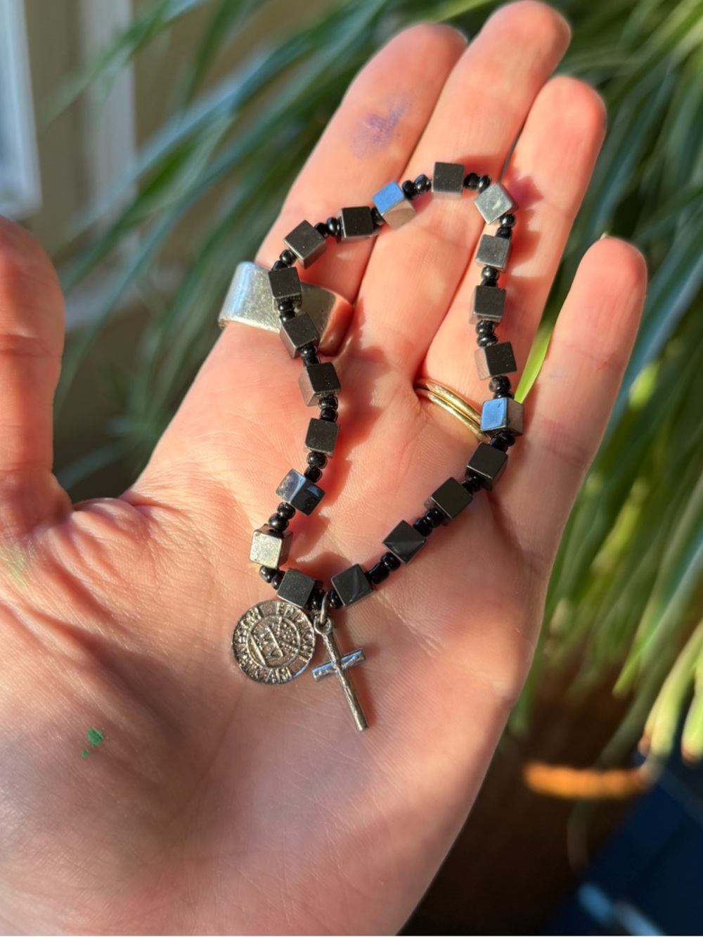 black beaded cross bracelet